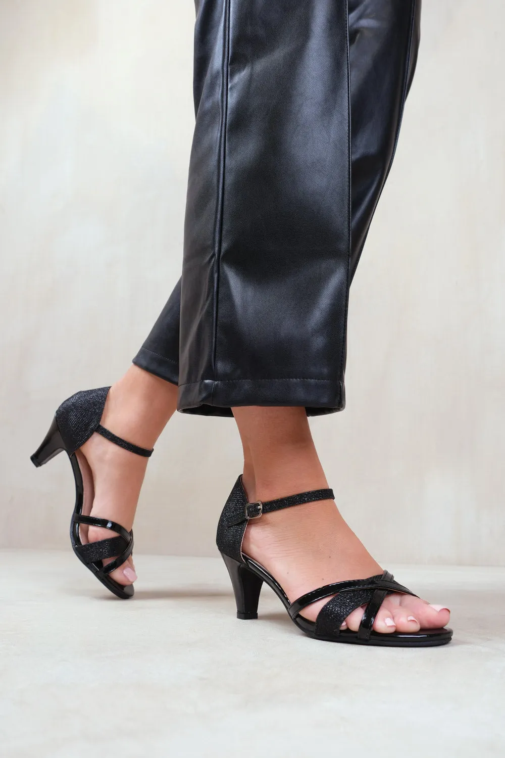 AMANDA MID HIGH HEEL WITH BUCKLE ANKLE STRAP IN BLACK GLITTER