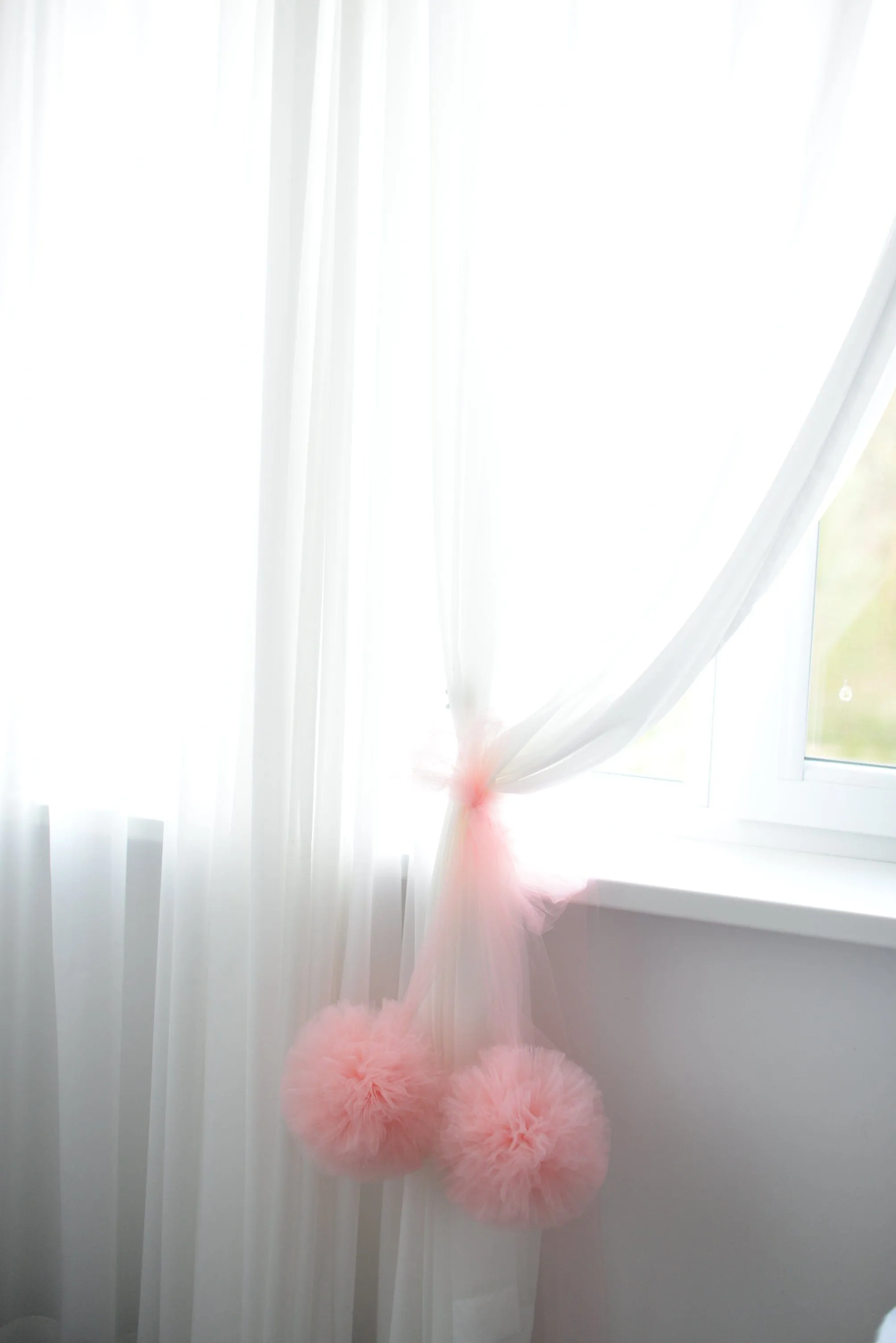 Blush pink tulle pom pom